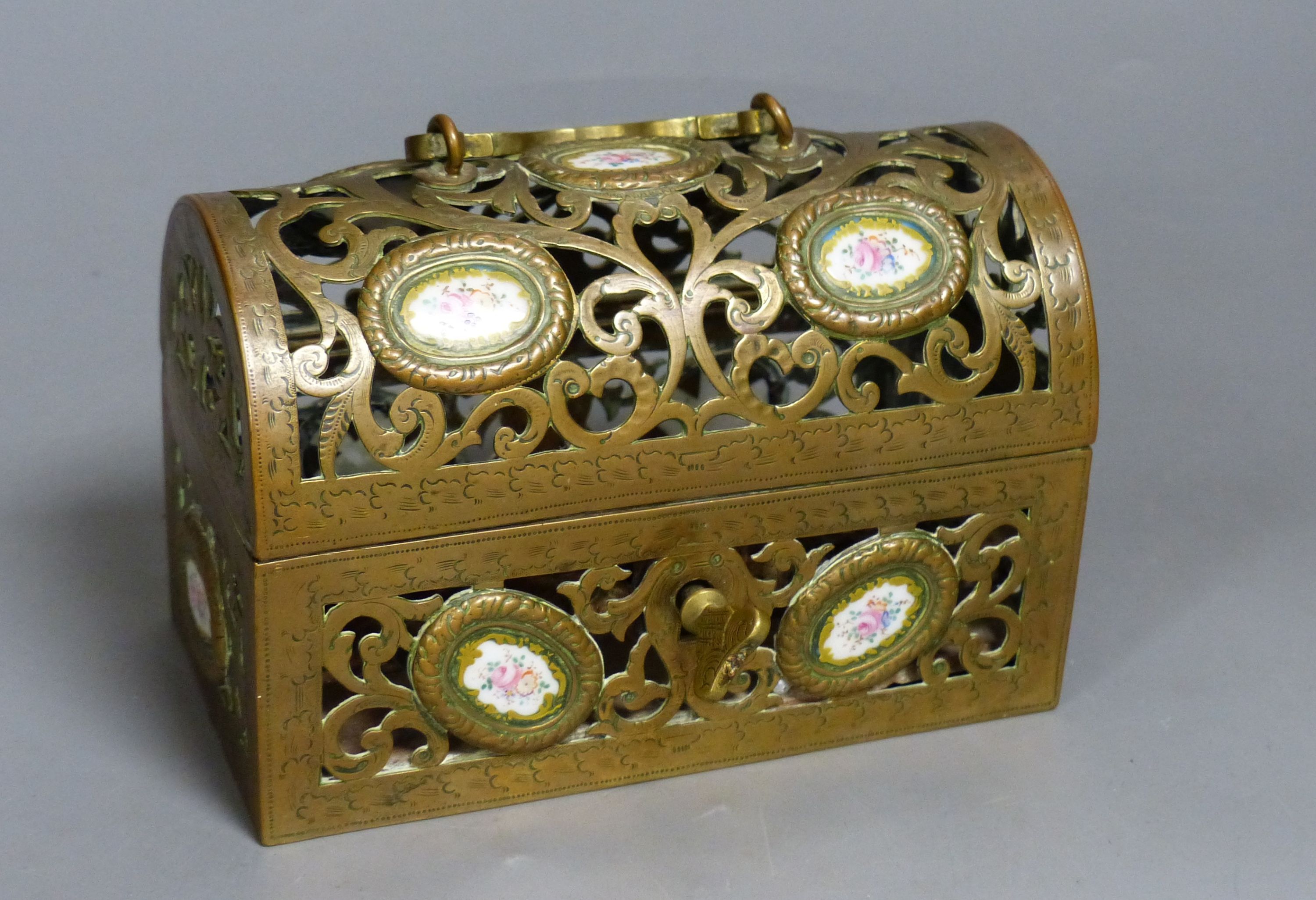 A 19th century French pierced and engraved bronze and enamel casket, 14cm
